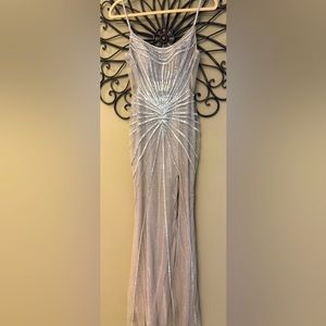 Gorgous prom dress! 
Size: 5.  Brand: GW  Color: champagne and silver